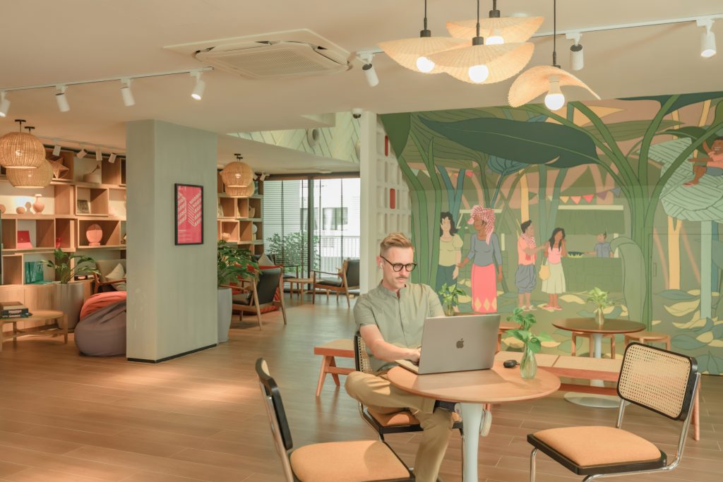 Digital nomad working at Commune at Rose Apple Square