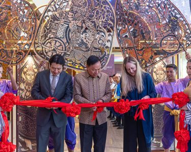 Ribbon-cutting ceremony marking the launch of “Shadows Beyond Time.”