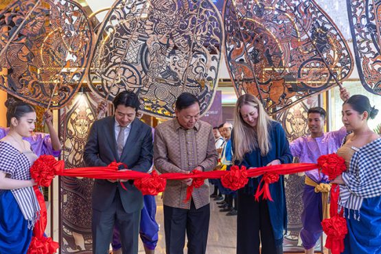 Ribbon-cutting ceremony marking the launch of “Shadows Beyond Time.”