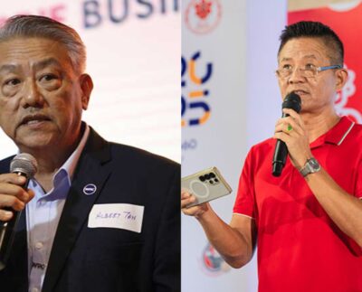 Albert Tan, Deputy Chairman of the Textile, Apparel, Footwear & Travel Goods Association in Cambodia, and Yeong Hock Ming, President of Singapore Club Cambodia.
