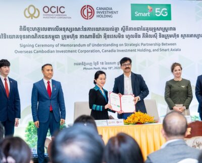 Smart Axiata and Canadia Group, including OCIC and CIH, during the signing of an MoU to advance digital transformation, connectivity, and technology-driven collaboration across Canadia’s business portfolio at Connexion, Phnom Penh, on May 18, 2026.