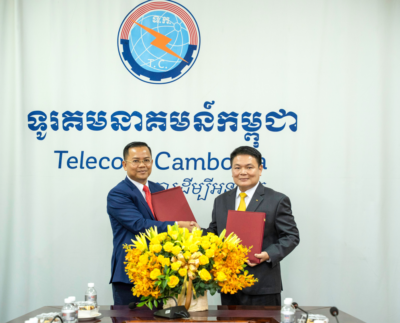 H.E. Dr. Soeung Morarith, Director General of Telecom Cambodia, and Mr. Ry Vanna, President & CEO of KB PRASAC Bank