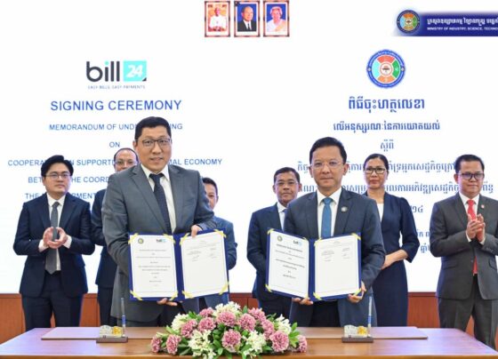 Andrey Sheen the CEO of Bill24 and H.E. Hem Vanndy, Minister of Industry, Science, Technology & Innovation and Chairman of the CCDIE.