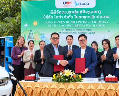LOCA CEO Souliyo Vongdala and Lao Securities Exchange CEO Siosavath Thirakul sign Lao’s first green bond at the Laos Securities Exchange in Vientiane. PIDG’s investment anchored commitments to the bond's complete subscription, leading to its successful signing on 4 September 2026.